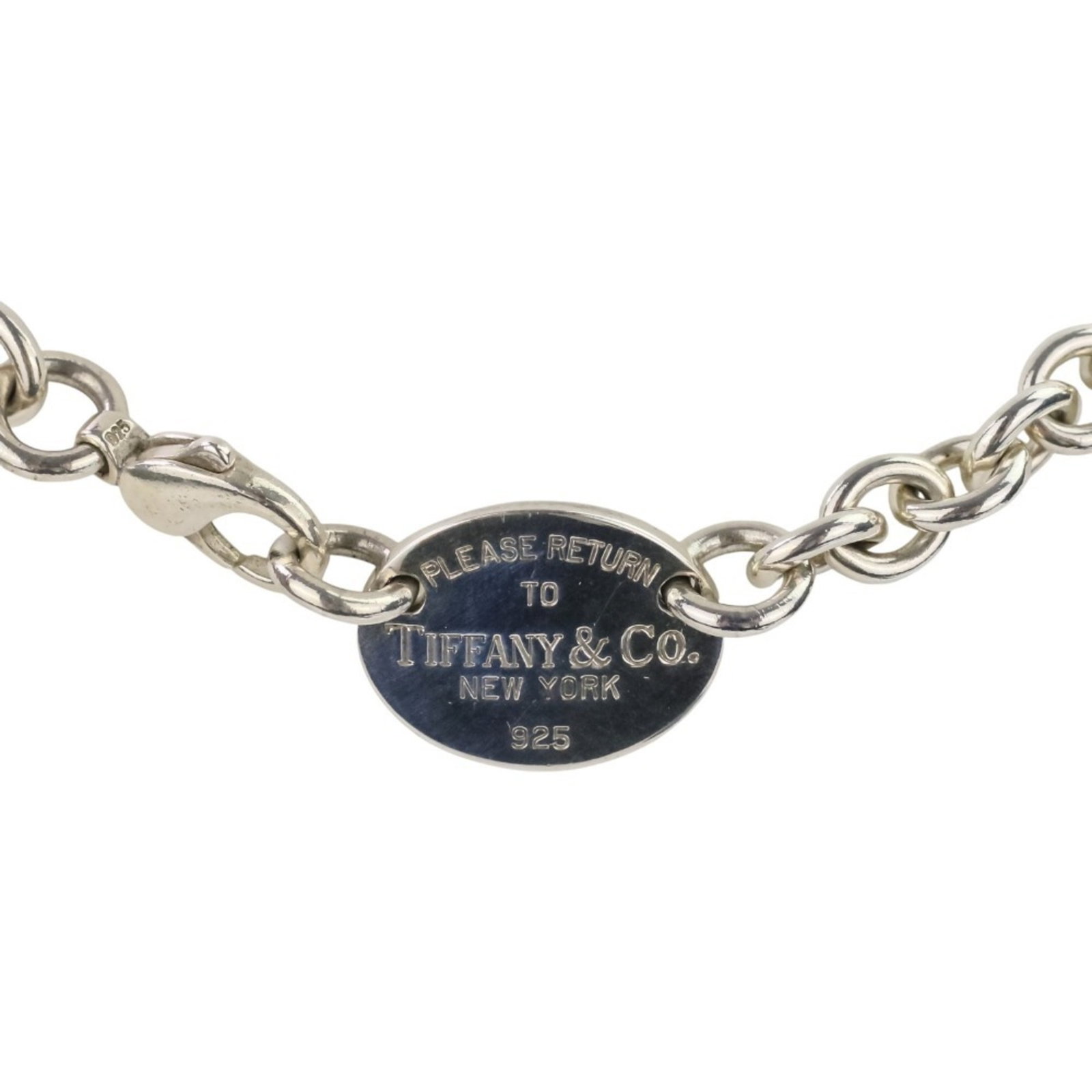 TIFFANY & CO. OVAL TAG CHOKER NECKLACE: Tiffany & Co. Oval Tag Choker Necklace Brand: Tiffany Type: Choker Material: Silver 925 Color: Silver Size: Neck Circumference 37 cm / 14.56'' Pendant Size 1.7mm x 2.3mm / 0.06'' x 0.09'' 