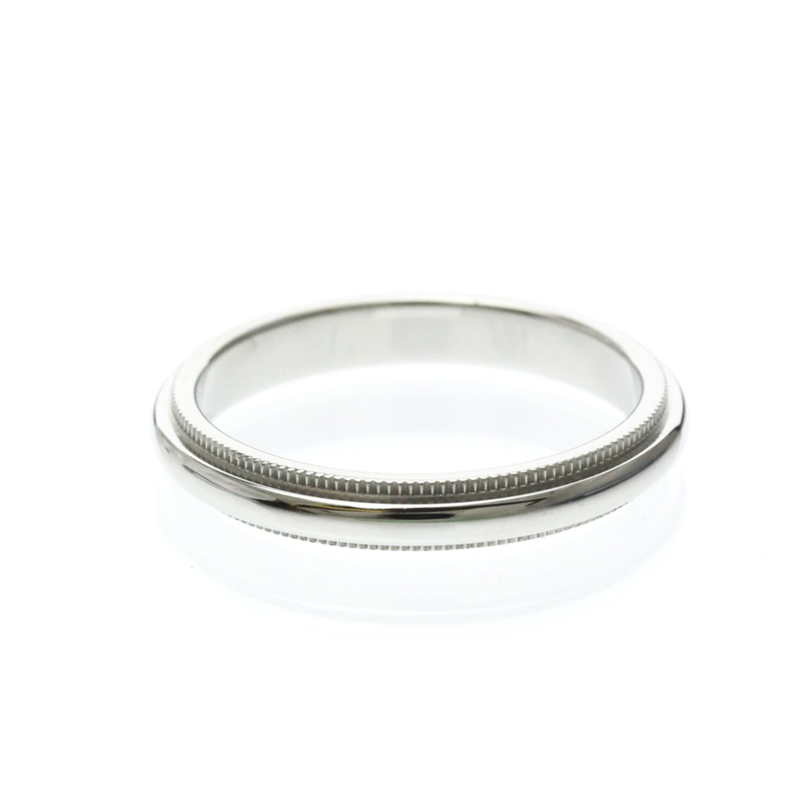 TIFFANY MILGRAIN RING PLATINUM: TIFFANY Milgrain Ring Platinum Brand: Tiffany Type: Band ring Material: Platinum Color: Silver Size: 6-6.5 US Accessories: None Accessories Notice: When purchasing pre-owned goods, please