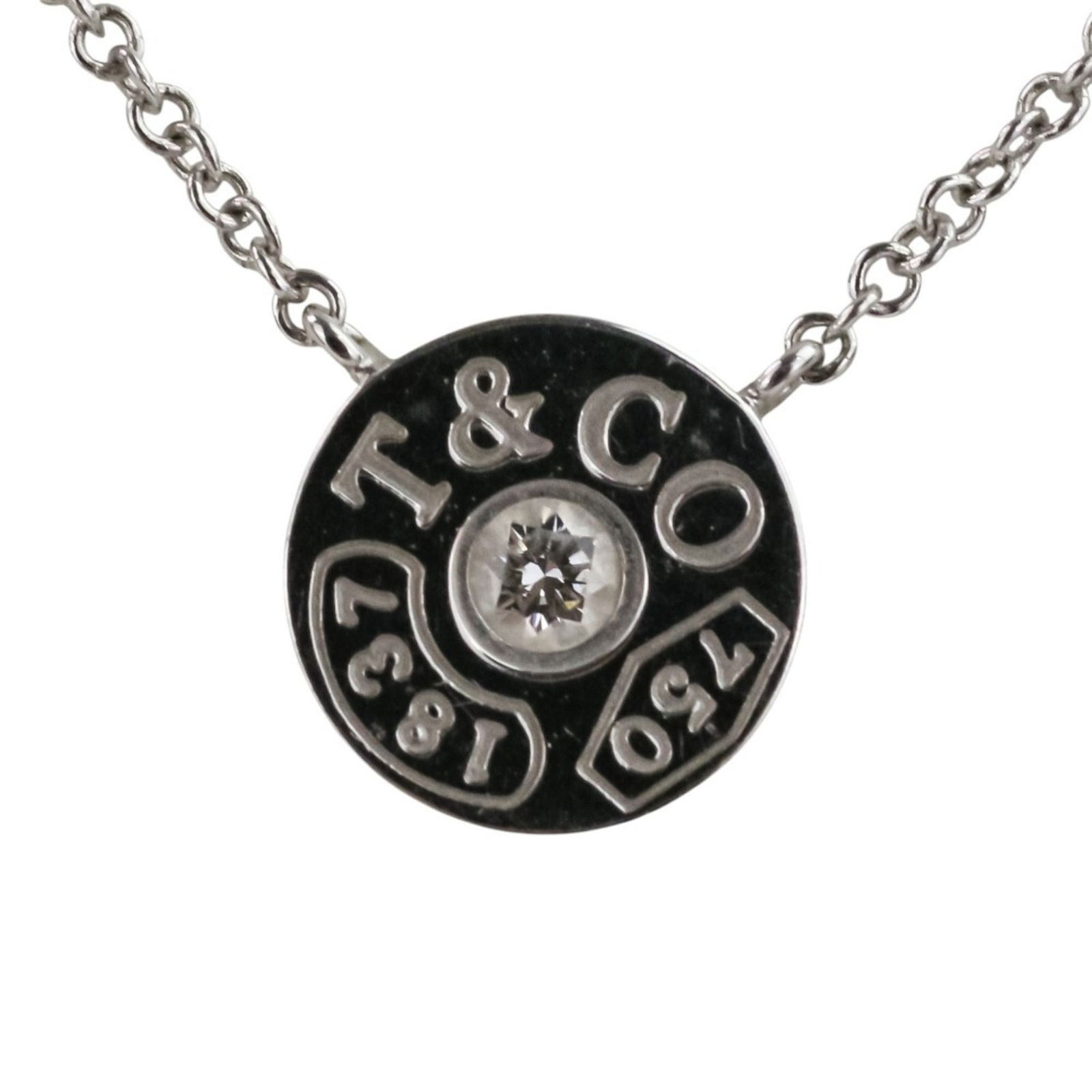 TIFFANY & CO. DIAMOND CIRCLE NECKLACE: Tiffany & Co. Diamond Circle Necklace Brand: Tiffany Type: Necklace Material: White gold Color: White Size: Neck Circumference 42 cm / 16.53'' Pendant Size 8mm x 8mm / 0.31'' x 0.31'' 