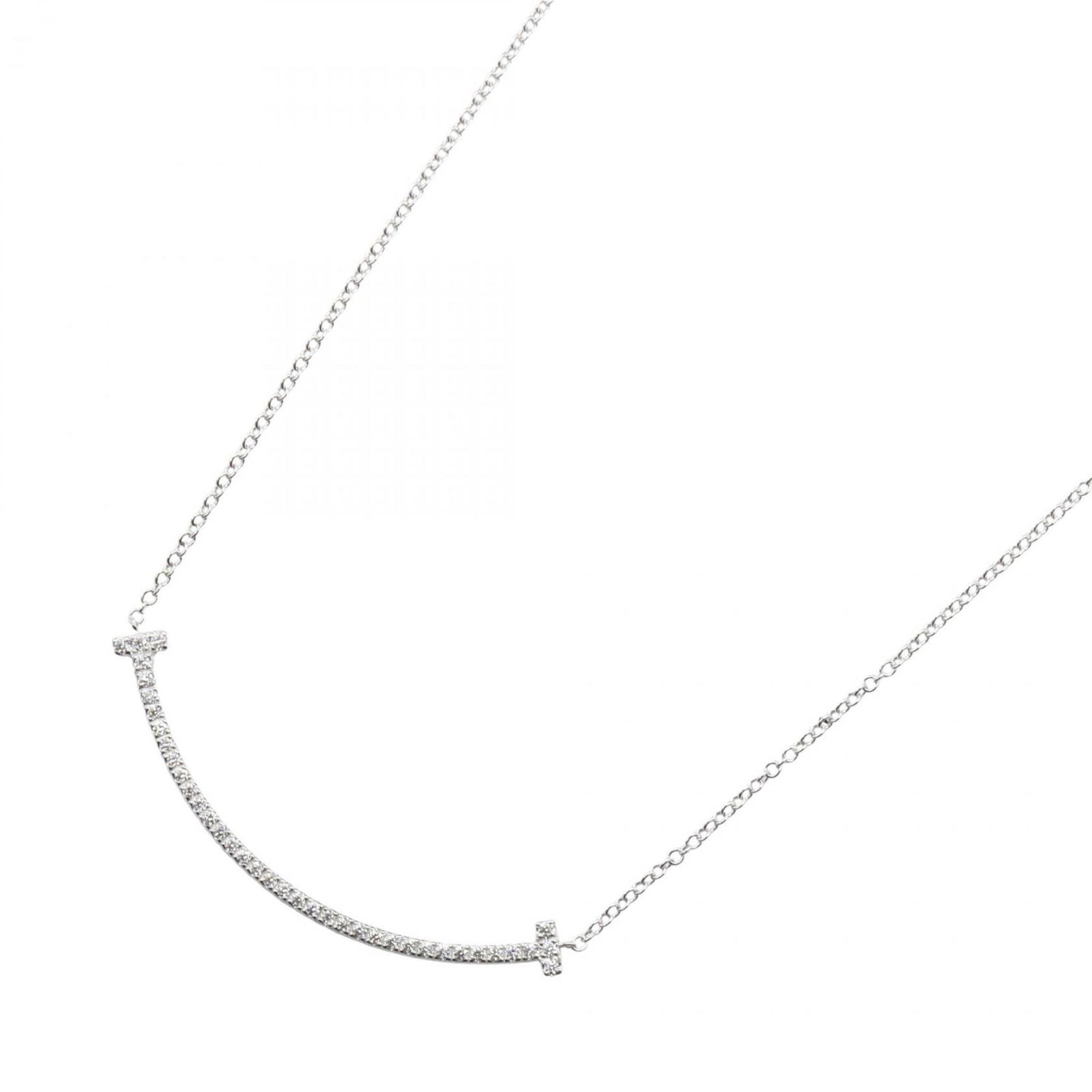 TIFFANY & CO. T SMILE SMALL DIAMOND NECKLACE: Tiffany & Co. T Smile Small Diamond Necklace Brand: Tiffany Type: Necklace Material: White gold (18K) Color: White gold Size: Neck Circumference 46 cm / 18.11'' Pendant Size 3mm x 36mm /