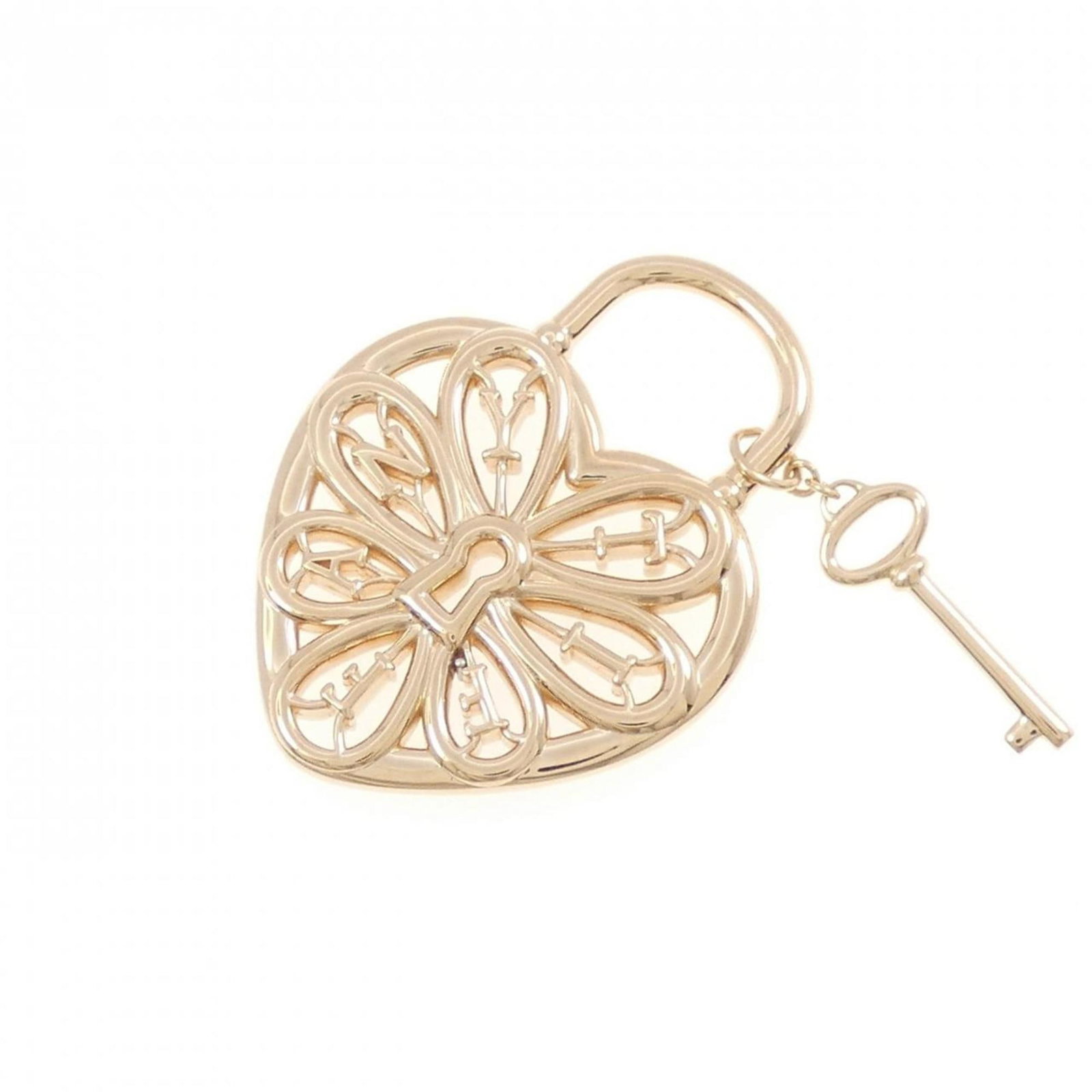 TIFFANY FILIGREE PENDANT: TIFFANY filigree pendant Brand: Tiffany Type: Pendant Material: Pink gold (18K) Color: Pink gold Size: Pendant Size 29.4mm x 22.4mm / 1.15'' x 0.88'' Accessories: None Accessories Notice: