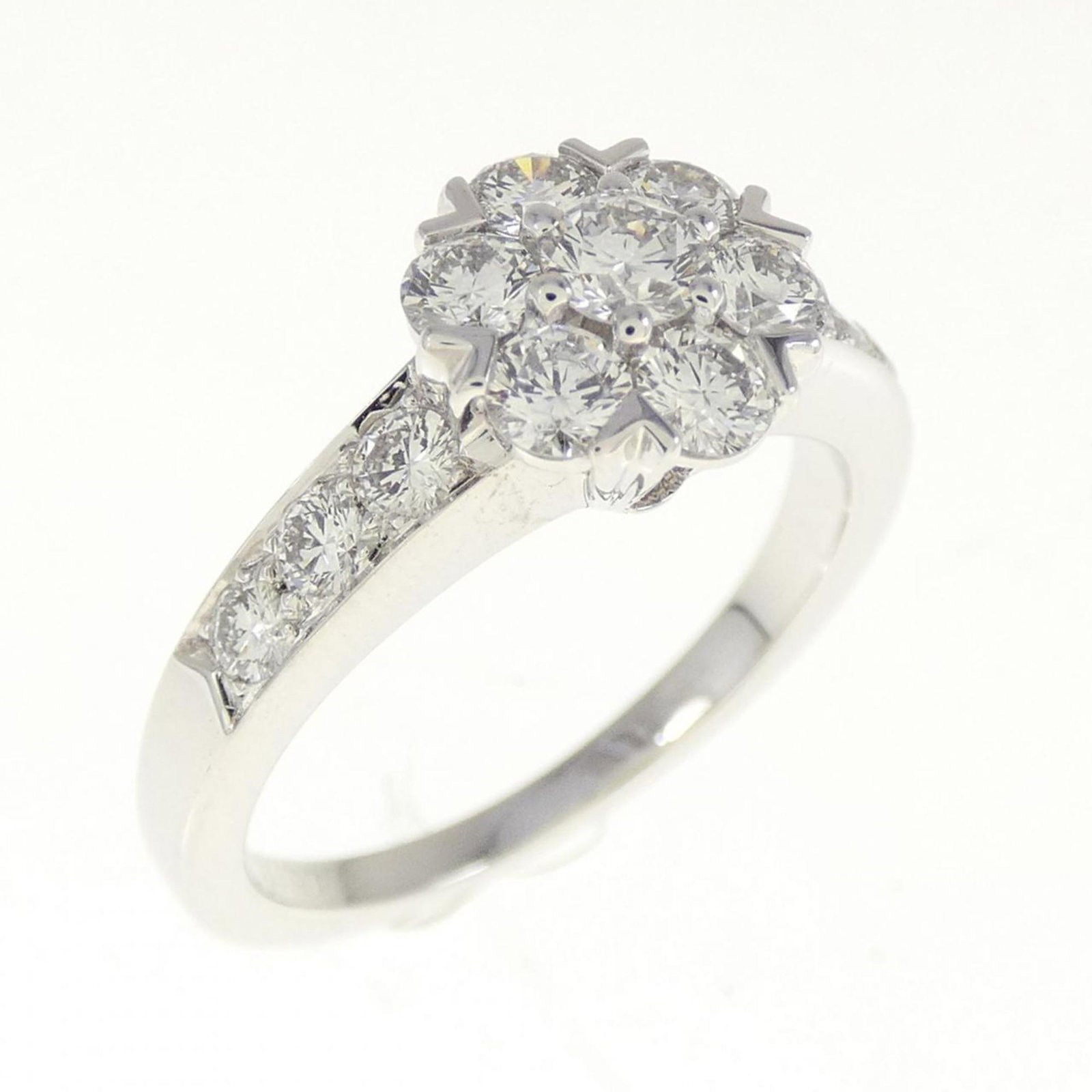 VAN CLEEF & ARPELS FLEURETTE SMALL RING: Van Cleef & Arpels Fleurette Small Ring Brand: Van Cleef & Arpels Type: Band ring Material: White gold (18K) Color: White gold Size: 5 US Accessories: None Accessories Notice: When purchas