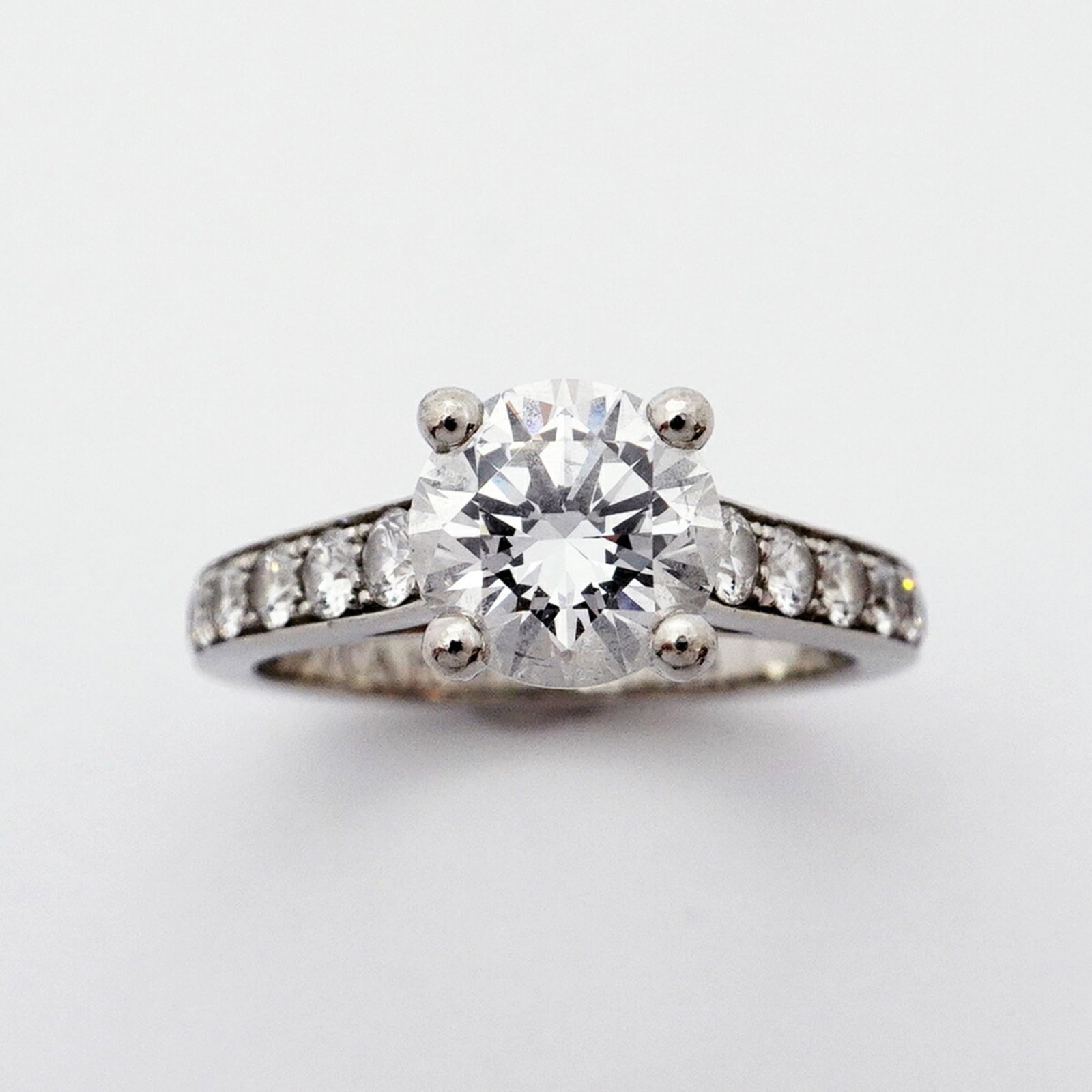 VAN CLEEF & ARPELS ROMANCE SOLITAIRE RING: Van Cleef & Arpels Romance Solitaire Ring, Brand: Van Cleef & Arpels Type: Band ring Material: Platinum 950 Color: Platinum Size: 4 US Accessories: None Accessories Notice: When purchasing