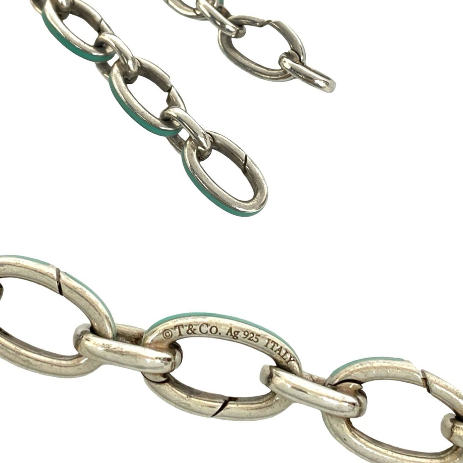 TIFFANY CLASPING BRACELET: Tiffany Clasping Bracelet Brand: Tiffany Type: Charm bracelet Material: Silver 925 Color: Blue, Silver Size: Length 18.5cm / 7.28'' Accessories: None Accessories Notice: When purchasing