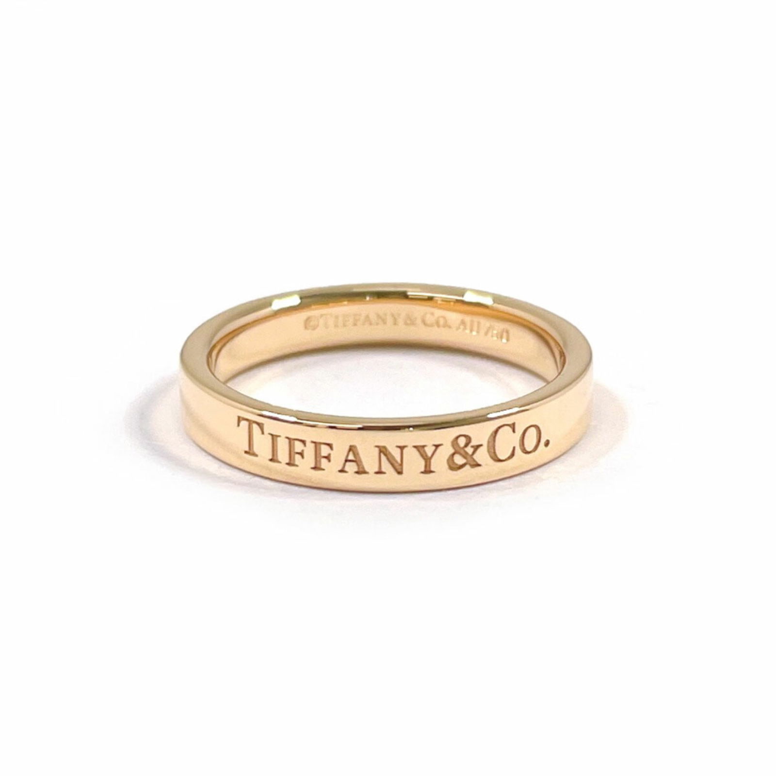 TIFFANY FLAT BAND RING IN 18K PINK GOLD: Tiffany Flat Band Ring in 18k Pink Gold Brand: Tiffany Type: Band ring Material: Pink gold (18K) Color: Pink gold Size: 4.5 US Accessories: None Accessories Notice: When purchasing pre-own