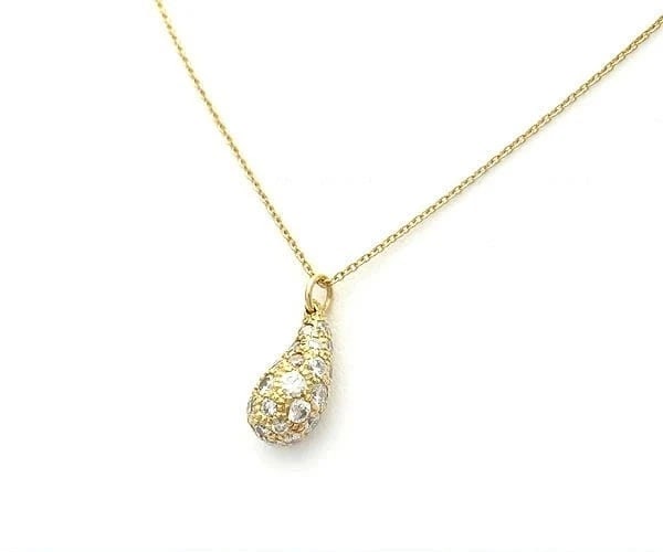 TIFFANY & CO. TEARDROP PAVE DIAMOND NECKLACE: Tiffany & Co. Teardrop Pave Diamond Necklace Brand: Tiffany & Co. Type: Necklace Material: 18K Yellow Gold Main Stone/Creation Natural Color: Yellow Gold Size: Pendant Size: Approx. 0.31 in (8 mm)