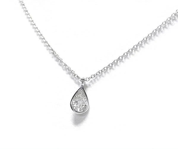 TIFFANY & CO. BY THE YARD PEAR SHAPE DIAMOND NECKLACE: Tiffany & Co. By the Yard Pear Shape Diamond Necklace Brand: Tiffany & Co. Type: Necklace Material: Platinum Main Stone/Creation Natural Color: Silver Size: Pendant Size: Approx. 0.20 in (5 mm) ×