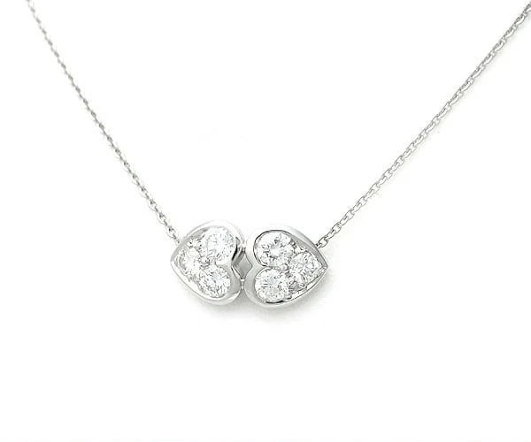 TIFFANY & CO. DOUBLE HEART DIAMOND NECKLACE: Tiffany & Co. Double Heart Diamond Necklace Brand: Tiffany & Co. Type: Necklace Material: Platinum Main Stone/Creation Natural Color: Silver Size: Pendant Size: Approx. 0.63 in (15.9 mm) × 0.33 i