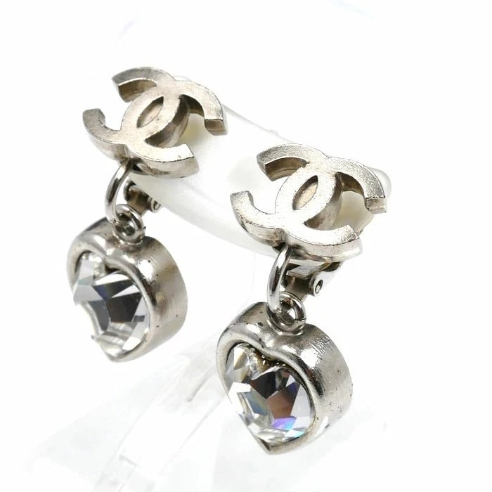 CHANEL COCO MARK HEART RHINESTONE EARRINGS: CHANEL Coco Mark Heart Rhinestone Earrings Brand: CHANEL Type: Earrings Material: Metal Main Stone/Creation Rhinestone Color: None Size: Width: approx. 0.52 in (13.2 mm) Height: approx. 1.18 in (3