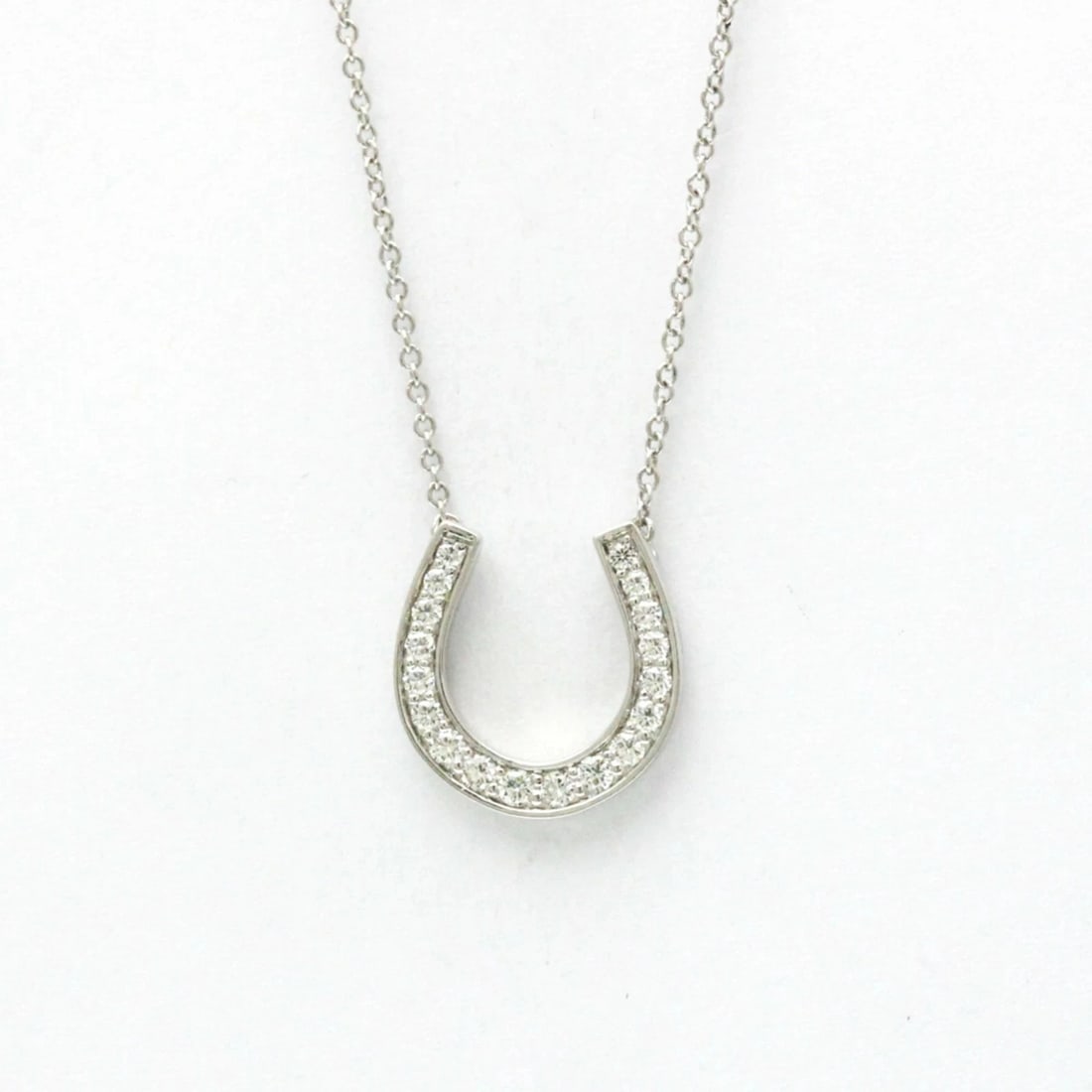 TIFFANY & CO. HORSESHOE DIAMOND PENDANT NECKLACE PT950 SILVER: Tiffany & Co. Horseshoe Diamond Pendant Necklace Pt950 Silver Brand: Tiffany & Co. Type: Necklace Material: Platinum Main Stone/Creation Natural Color: Silver Size: Pendant Size: Height 0.55''