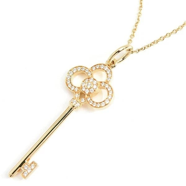 TIFFANY & CO. CROWN KEY DIAMOND LONG NECKLACE 18K YELLOW GOLD: Tiffany & Co. Crown Key Diamond Long Necklace 18K Yellow Gold Brand: Tiffany & Co. Type: Necklace Material: 18K Yellow Gold Main Stone/Creation Natural Color: Yellow Gold Size: Size: Chain Length: