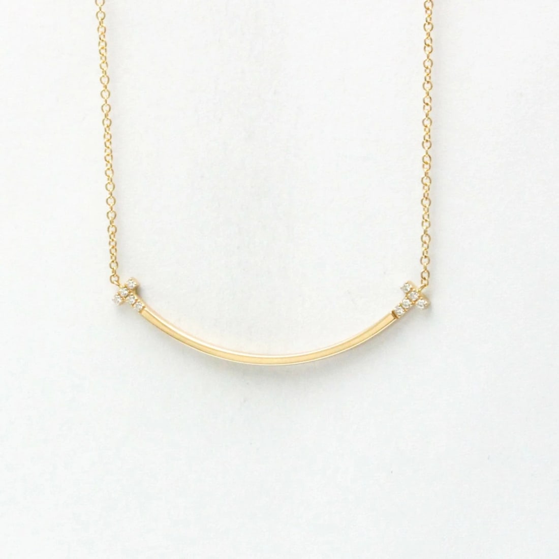 TIFFANY & CO. SMILE SIDE DIAMOND NECKLACE SMALL K18 PINK GOLD: Tiffany & Co. Smile Side Diamond Necklace Small K18 Pink Gold Brand: Tiffany & Co. Type: Pendant Material: Pink Gold (K18 / 18K) Main Stone/Creation Natural Color: Pink Gold Size: Necklace Length: