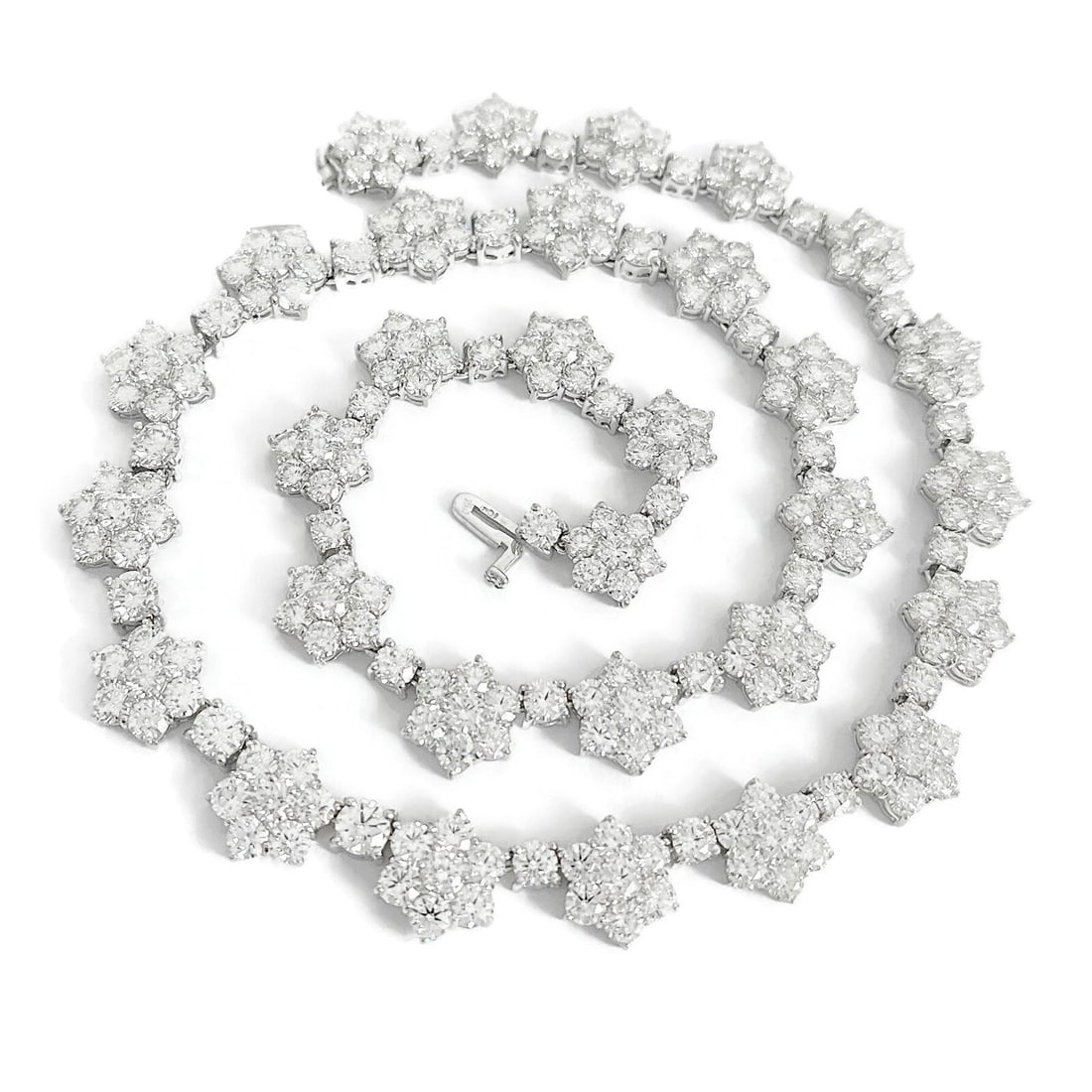 CLUSTER DIAMOND FLOWER TENNIS STATEMENT NECKLACE: Cluster Diamond Flower Tennis Statement Necklace Brand: Unbranded Type: Necklace Material: 18K white gold Main Stone/Creation Natural Color: Silver Size: Length: 16 inches Width: 11.2 mm in