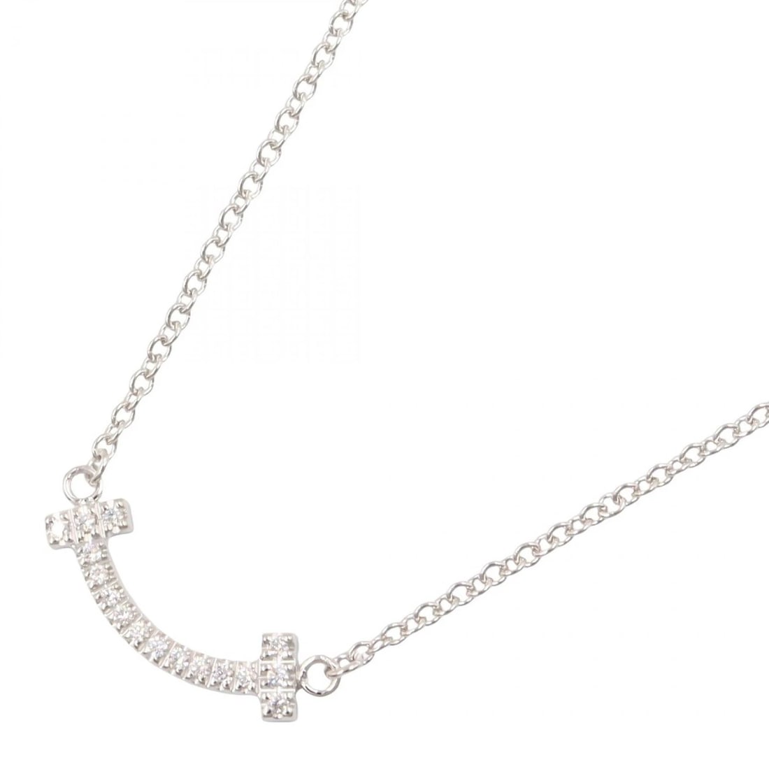 TIFFANY?CO T SMILE MINI DIAMOND NECKLACE 18KWG: TIFFANY?CO T Smile Mini Diamond Necklace 18KWG Brand: TIFFANY?CO Type: Necklace Material: K18WG Color: Silver Size: Neck rotation?41.5/45cm(16.3") Motif W?13mm x H?3mm(0.5" x 0.1") 