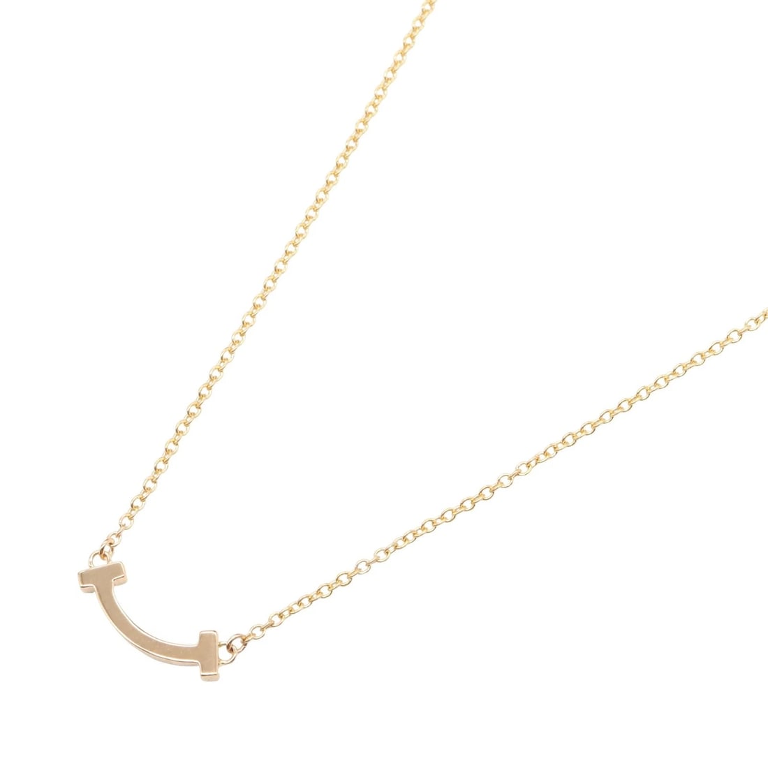 TIFFANY?CO T SMILE MINI NECKLACE PENDANT: TIFFANY?CO T Smile Mini Necklace pendant Brand: TIFFANY?CO Type: Necklace Material: K18PG?Rose Gold? Color: Gold Size: Neck rotation?40.5/45.5cm(15.9") Motif W?13mm x H?3.5mm(0.5" x 0.1") Accesso