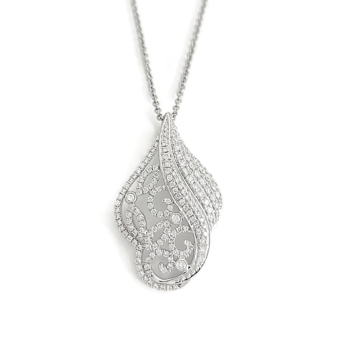 ASYMMETRICAL FLORAL DIAMOND FILIGREE PENDANT NECKLACE: Asymmetrical Floral Diamond Filigree Pendant Necklace Brand: Unbranded Type: Necklace Material: 18K white gold (pendant); 14K white gold (chain) Main Stone/Creation Natural Color: Silver Size: