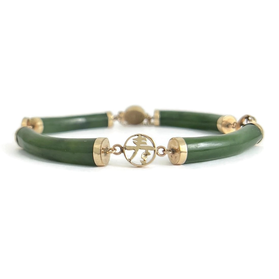 VINTAGE GREEN JADE CHINESE SYMBOL BRACELET: Vintage Green Jade Chinese Symbol Bracelet Brand: Estate Type: Bracelet Material: 10K yellow gold Color: Green Size: Length: 7.5 inches inner circumference Width: 8.5 mm Accessories: None