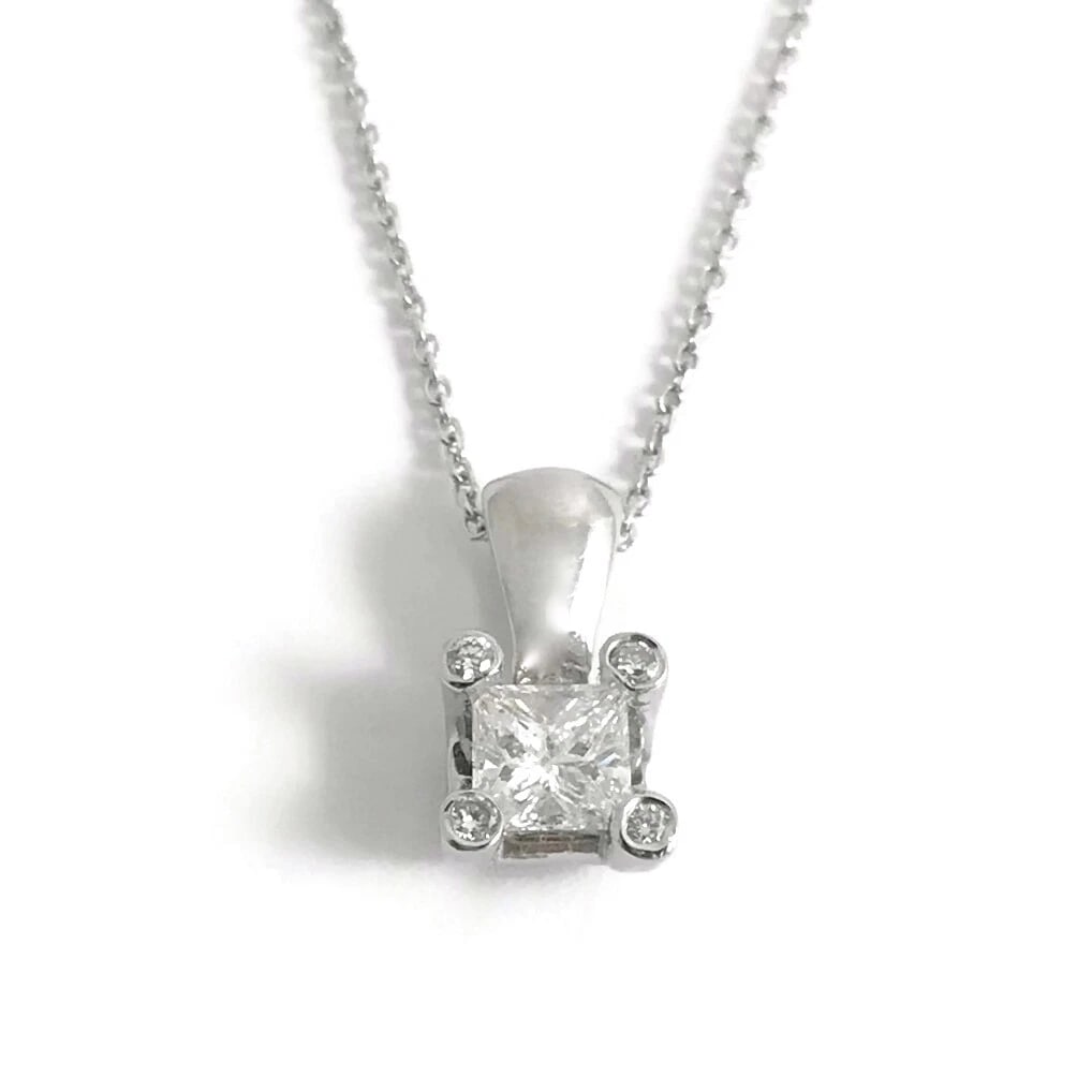PRINCESS CUT DIAMOND SOLITAIRE PENDANT NECKLACE: Princess Cut Diamond Solitaire Pendant Necklace Brand: Unbranded Type: Necklace Material: 14K White Gold Main Stone/Creation Natural Color: Silver Size: Length: 16 inches Pendant: 13.6 mm