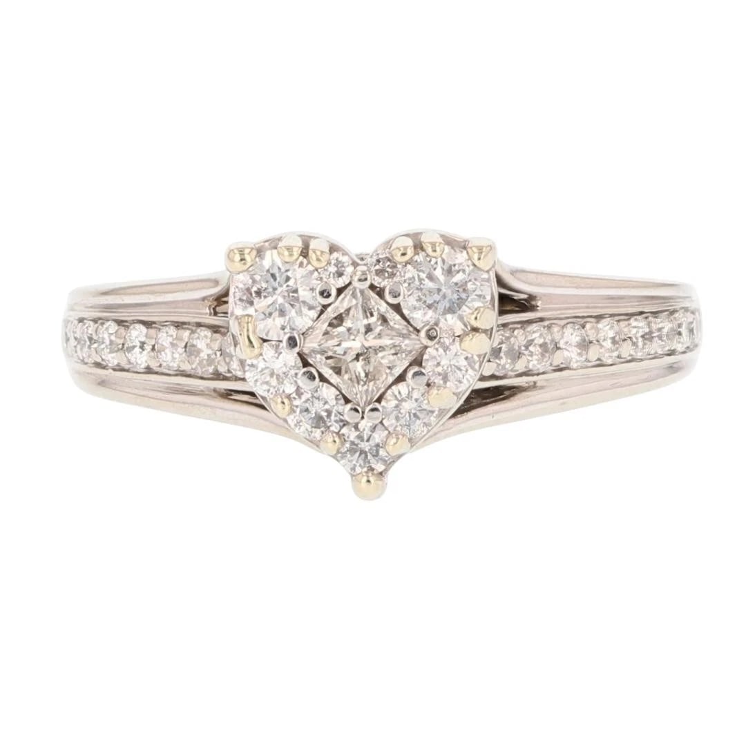 MULTI-CUT DIAMOND HEART-SHAPED CLUSTER RING: Multi-Cut Diamond Heart-Shaped Cluster Ring Brand: Unbranded Type: Ring Material: 10k White Gold Main Stone/Creation Natural Color: None Size: 7.5 US Accessories: None Accessories Notice: