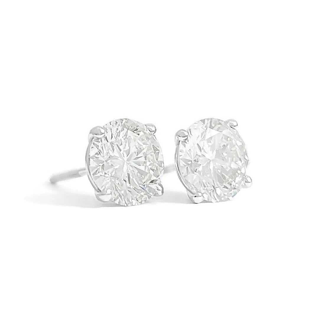 ROUND DIAMOND STUD EARRINGS 14K WHITE GOLD: Round Diamond Stud Earrings 14K White Gold Brand: Unbranded Type: Earrings Material: 14K White Gold Main Stone/Creation Natural Color: White Size: Measurements: 8.1 mm Accessories: None