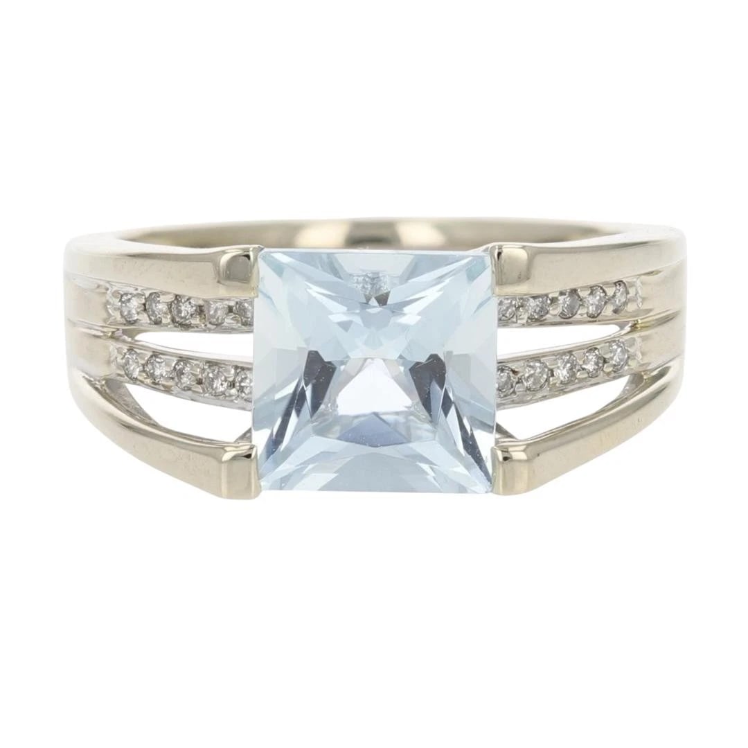 PRINCESS CUT AQUAMARINE WITH DIAMOND ACCENTS RING: Princess Cut Aquamarine with Diamond Accents Ring Brand: Unbranded Type: Ring Material: 14k White Gold Main Stone/Creation Aquamarine Color: Main Stone Color: Light Slightly Grayish Blue Size: