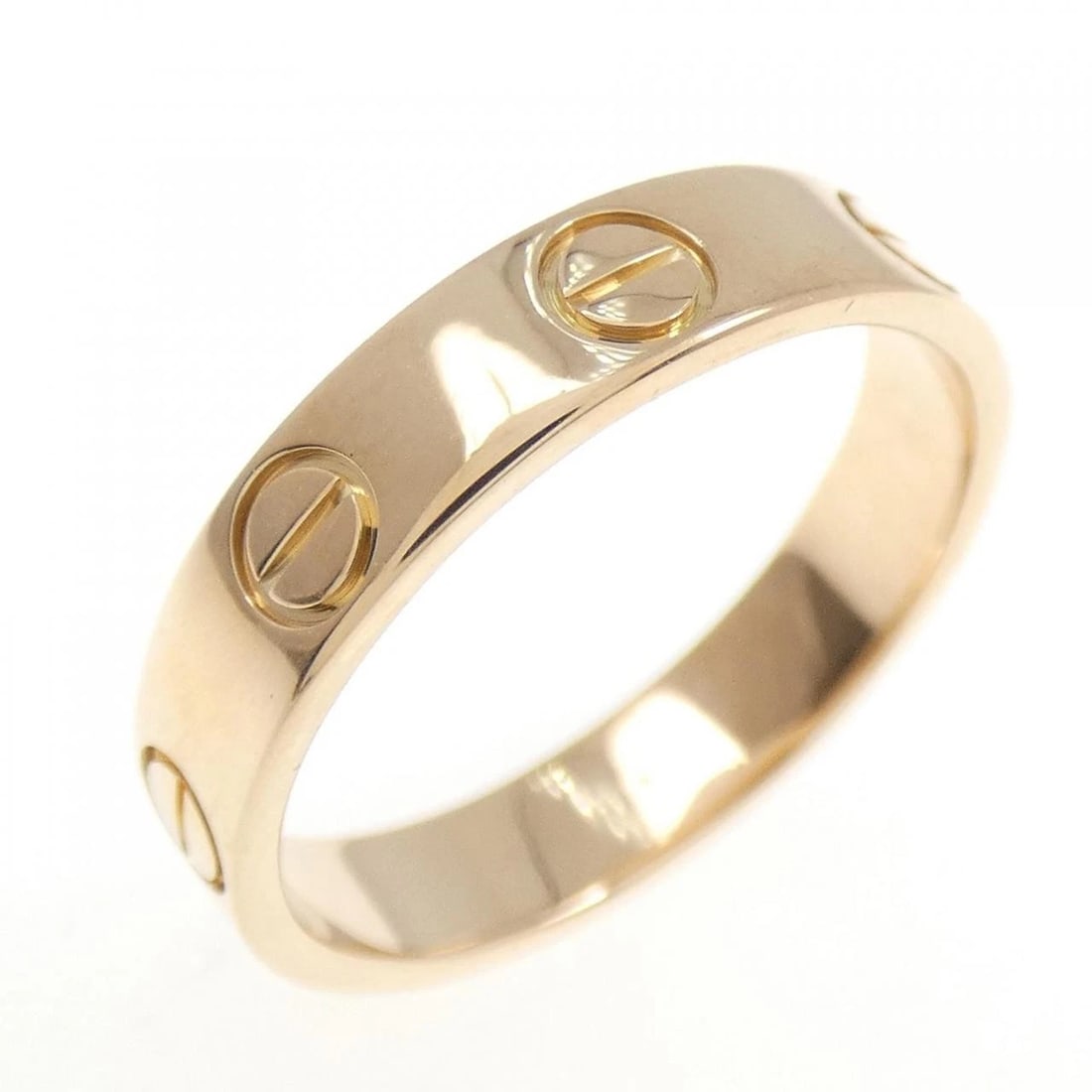 CARTIER MINI LOVE RING: Cartier Mini Love Ring Brand: Cartier Type: Ring Material: 750 Pink Gold Color: Pink Gold Size: 4-4.5 (US size) Accessories: None Accessories Notice: When purchasing pre-owned goods, pleas