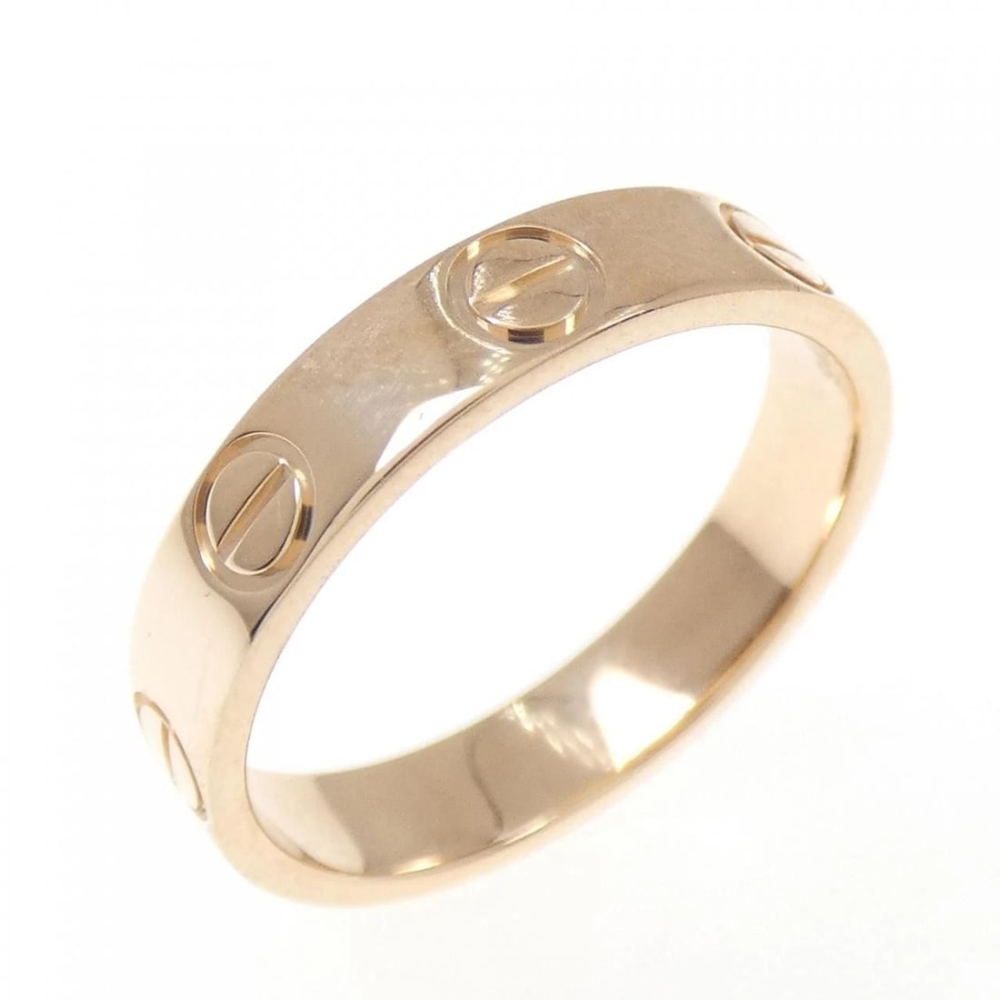CARTIER MINI LOVE RING: Cartier Mini Love Ring Brand: Cartier Type: Ring Material: 750 Pink Gold Color: Pink Gold Size: 4-4.5 (US size) Accessories: None Accessories Notice: When purchasing pre-owned goods, pleas
