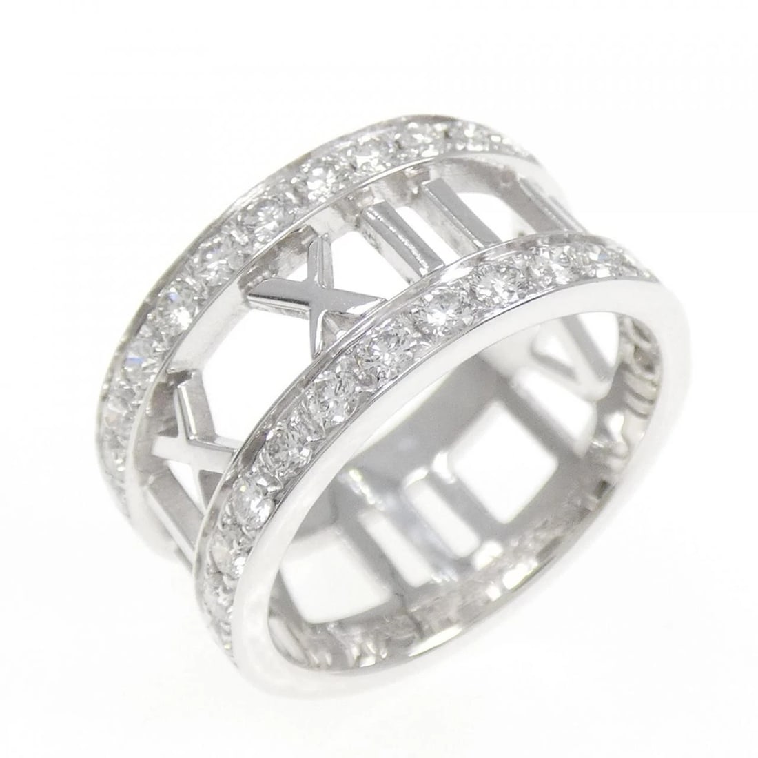 TIFFANY & CO. ATLAS RING: Tiffany & Co. Atlas Ring Brand: Tiffany Type: Ring Material: 750 White Gold Main Stone Natural Color: White Gold Size: 5 (US size) Accessories: None Accessories Notice: When purchasing