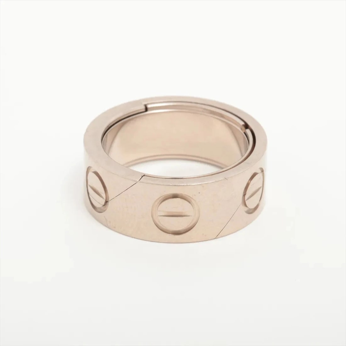 CARTIER ASTRO LOVE RING 750(WG): Cartier Astro Love Ring 750(WG) Brand: Cartier Type/Style: Ring Material: 750(WG), Color: Not Specified Size: 4 US Accessories: None Accessories Notice: When purchasing pre-owned goods, pl