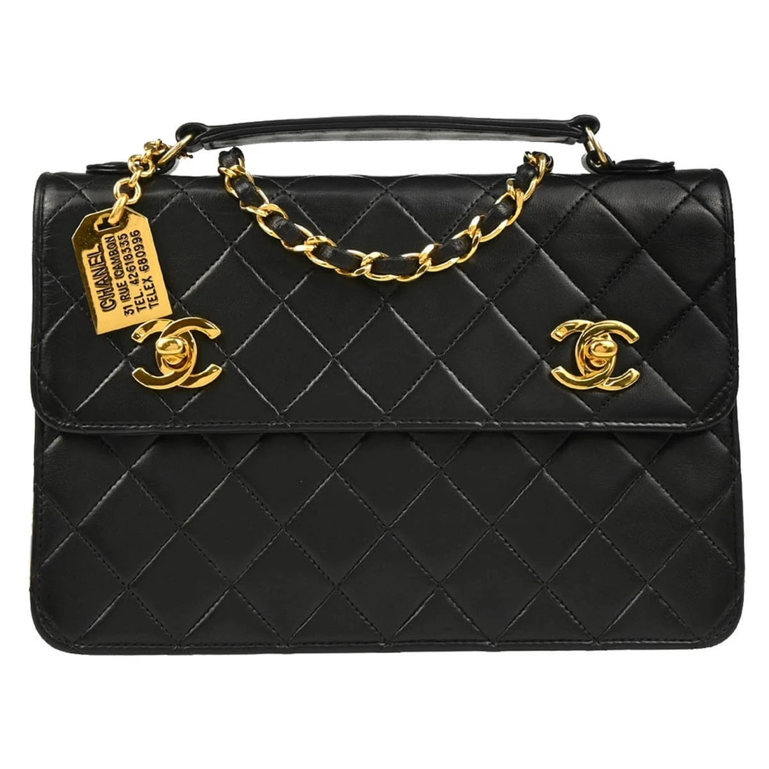 CHANEL BLACK LAMBSKIN 2WAY HANDBAG: Chanel Black Lambskin 2way Handbag Brand: CHANEL Type/Style: Top Handle Bag Material: Lambskin Color: Black Size: W 9.1 x H 6.3 x D 2.0 " Handle Drop. 1.2 " Accessories: None Accessories