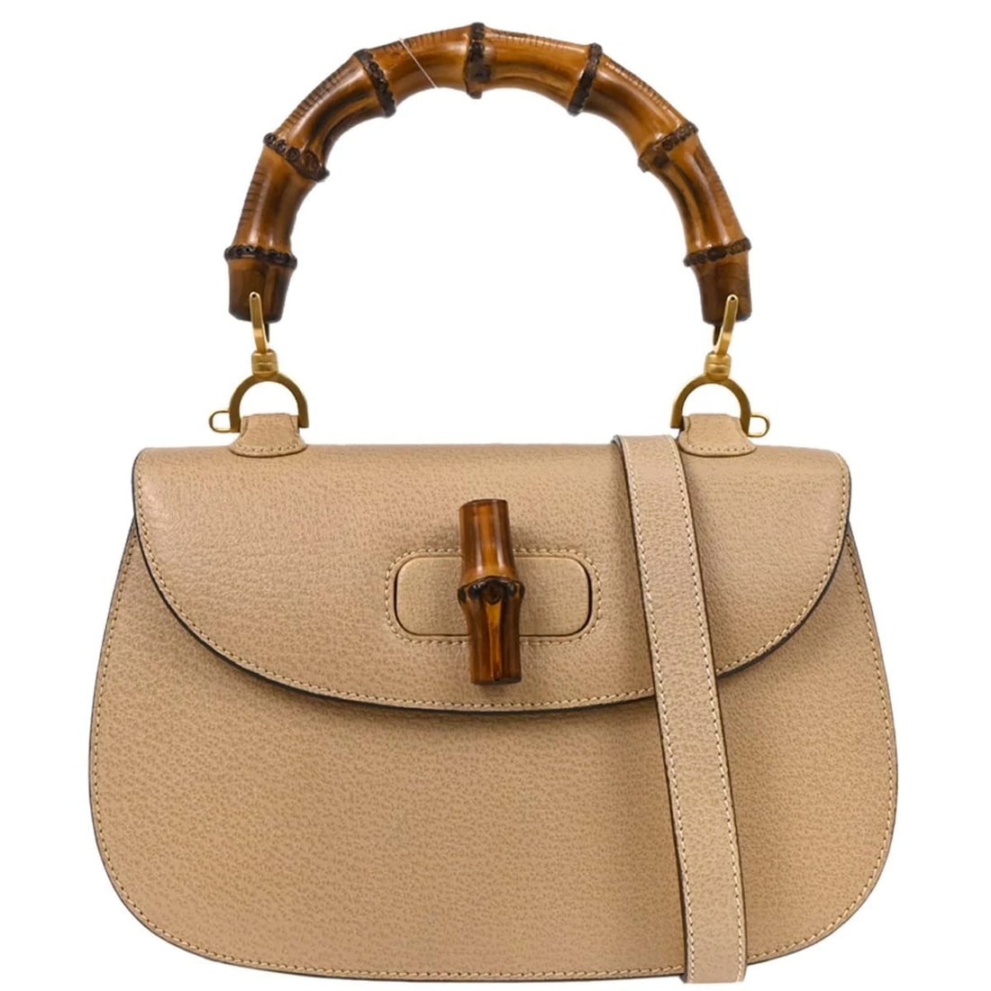 GUCCI BEIGE PIGSKIN BAMBOO 2WAY HANDBAG: Gucci Beige Pigskin Bamboo 2way Handbag Brand: Gucci Type/Style: Top Handle Bag Material: Pigskin, Bamboo Color: Beige Size: W 9.8 x H 6.7 x D 2.8 " Handle Drop. 5.5 " Strap Drop. 20.1 " Accessor