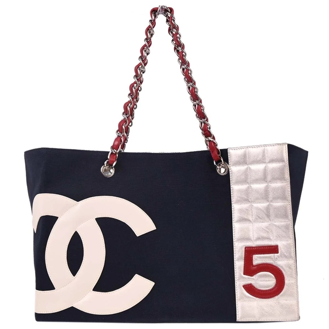 CHANEL NAVY SILVER CANVAS NO.5 CHOCO BAR TOTE HANDBAG: Chanel Navy Silver Canvas No.5 Choco Bar Tote Handbag Brand: CHANEL Type/Style: Top Handle Bag Material: Canvas, Lambskin, Calfskin Color: Navy, Silver, White, Red Size: W 14.2 x H 9.4 x D 6.3 " H