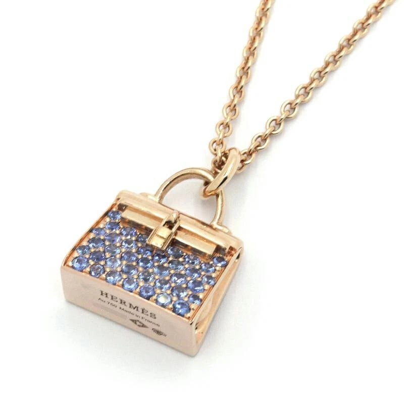 HERMES PENDANT AMULET KELLY SAPPHIRE 18K: Hermes Pendant Amulet Kelly Sapphire 18K Brand: Hermes Type/Style: Pendant Material: 18kPG, Main Stone/Creation sapphire Color: Gold Size: Effective length 37cm/39cm Motif 12.4mm x 14.8mm