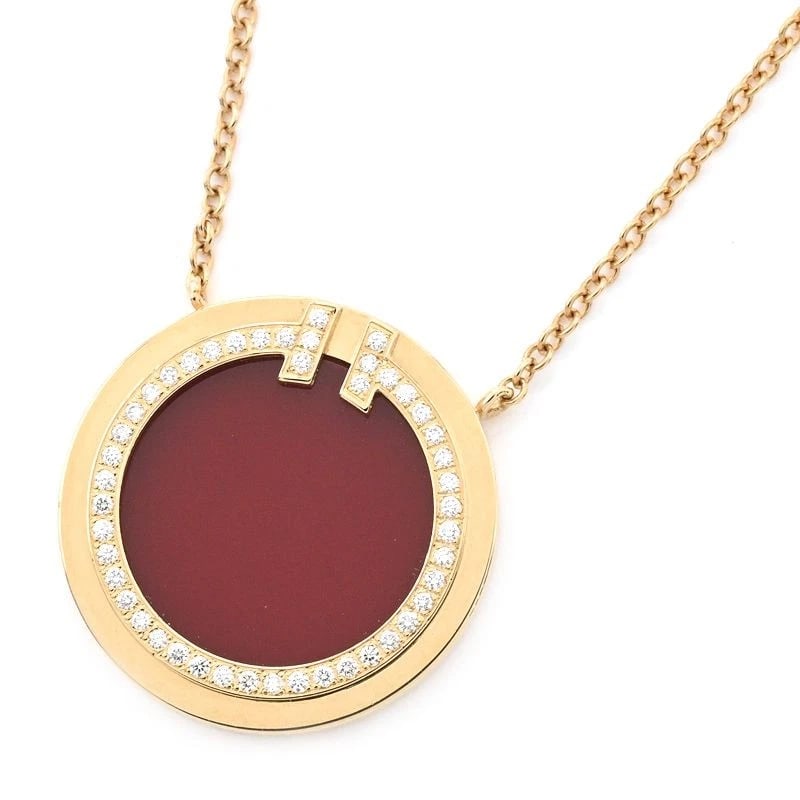 TIFFANY & CO. TIFFANY T DIAMOND & CARNELIAN CIRCLE PENDANT: Tiffany & Co. Tiffany T Diamond & Carnelian Circle Pendant Brand: Tiffany & Co. Type/Style: Pendant Material: K18YG, Main Stone/Creation Natural Color: Gold Size: Effective length 45cm/40cm Chain