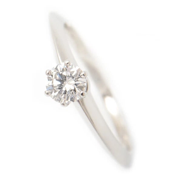 TIFFANY & CO. RING SOLITAIRE DIAMOND: Tiffany & Co. Ring Solitaire Diamond Brand: Tiffany & Co. Type/Style: Ring Material: Platinum 950, Main Stone/Creation Natural Color: Silver Size: 4US Accessories: None Accessories Notice: