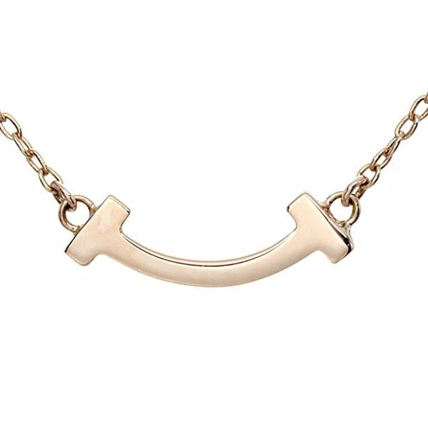 TIFFANY & CO. 18K PG T SMILE MINI NECKLACE: Tiffany & Co. 18K PG T Smile Mini Necklace Brand: Tiffany & Co. Type/Style: Necklace Material: 18KPG, Main Stone/Creation natural Color: Gold Size: Length: Approx. 40.5cm/46cm Top: Approx.