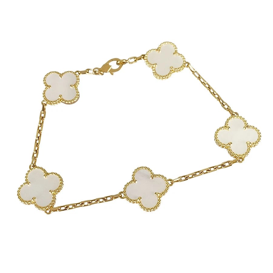 VAN CLEEF & ARPELS VINTAGE ALHAMBRA YELLOW GOLD SHELL BRACELET (1 of 6)