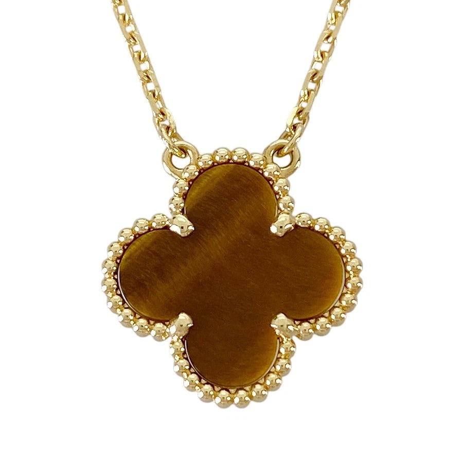 VAN CLEEF & ARPELS VINTAGE ALHAMBRA YELLOW GOLD TIGER EYE NECKLACE: Van Cleef & Arpels Vintage Alhambra Yellow gold Tiger Eye Necklace Brand: Van Cleef & Arpels Type/Style: Necklace Material: 18K Yellow Gold, Main Stone/Creation Tiger's Eye Color: Gold Size: Motif