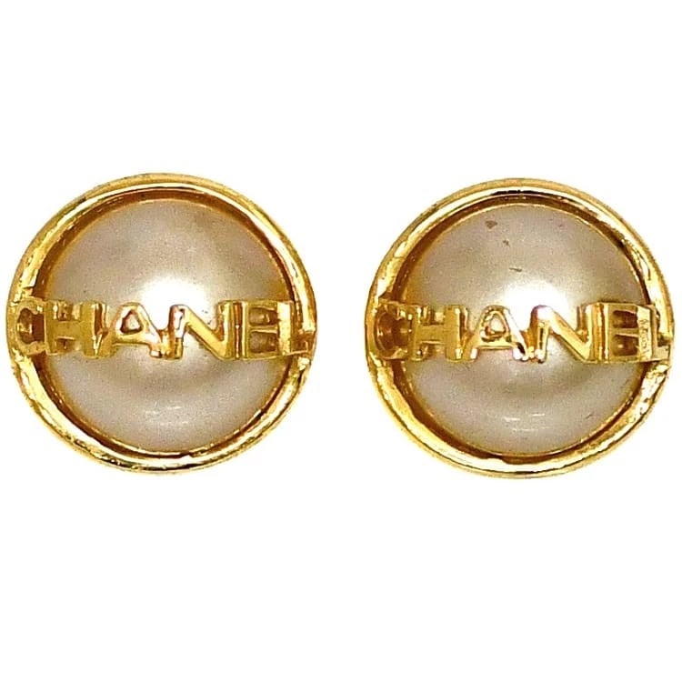 CHANEL GOLD PEARL WHITE LOGO GOLD PLATED EARRINGS: Chanel Gold Pearl White Logo Gold Plated Earrings Brand: Chanel Type/Style: Earring Material: Metal Purity , Metal Gold Plated, Main Stone/Creation Pearl Color: gold Size: (Approx.)