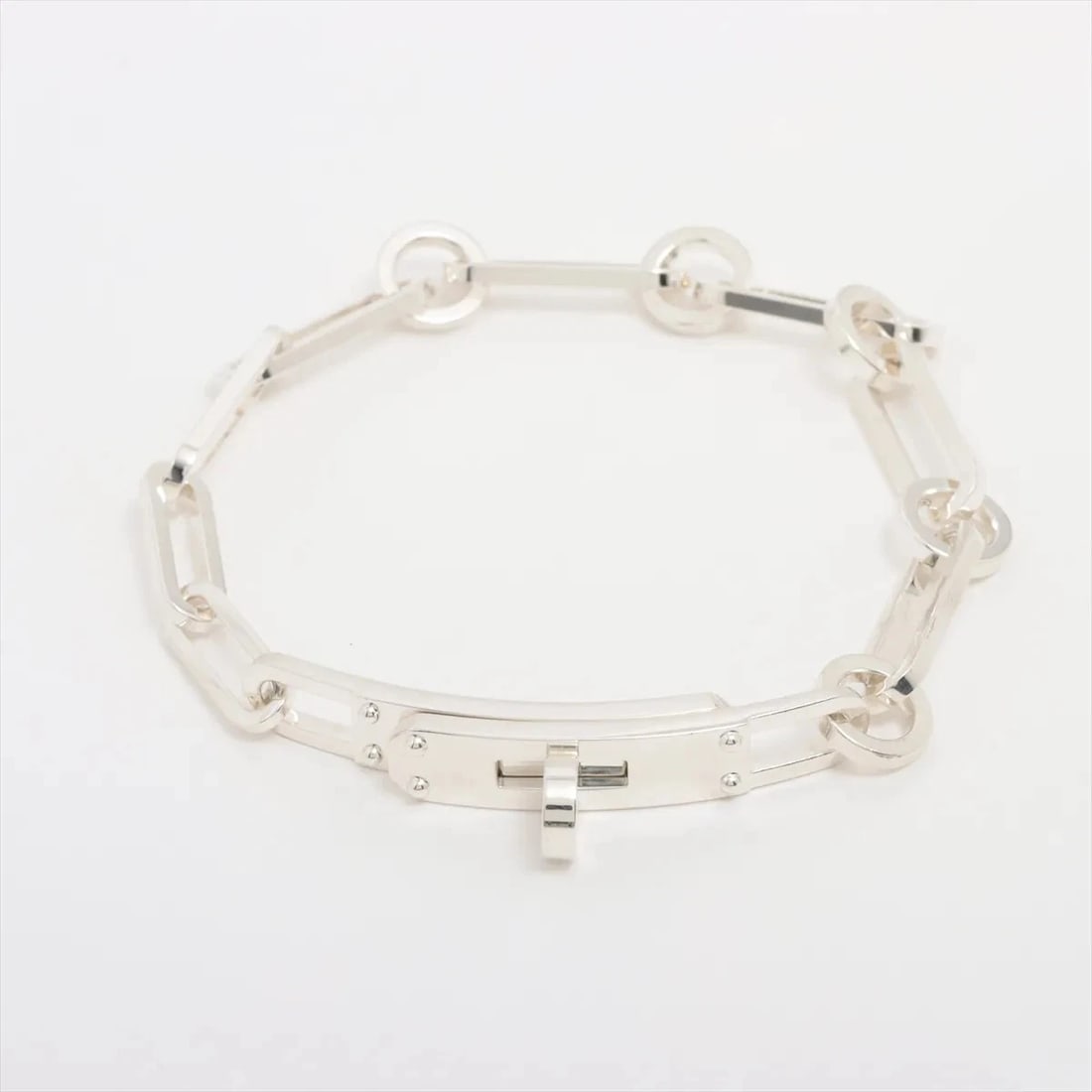 HERMES KELLY SCHONE SIMPLE TOUR BRACELET: Hermes Kelly Schone Simple Tour Bracelet Brand: Hermes Type/Style: Bracelet Material: 925, Color: Silver Size: Bracelet length:19.5 Accessories: None Accessories Notice: When purchasing