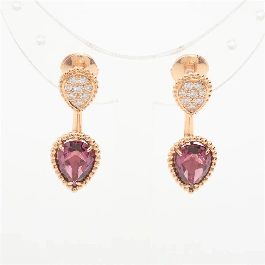 BOUCHERON SERPENT BOHÈME 2 MOTIFS RHODOLITE GARNET DIAMOND PIERCING JEWELRY: Boucheron Serpent Bohème 2 motifs Rhodolite Garnet diamond Piercing jewelry Brand: Boucheron Type/Style: Piercing jewelry Material: 750, Main Stone/Creation natural Color: Not Specified Size: