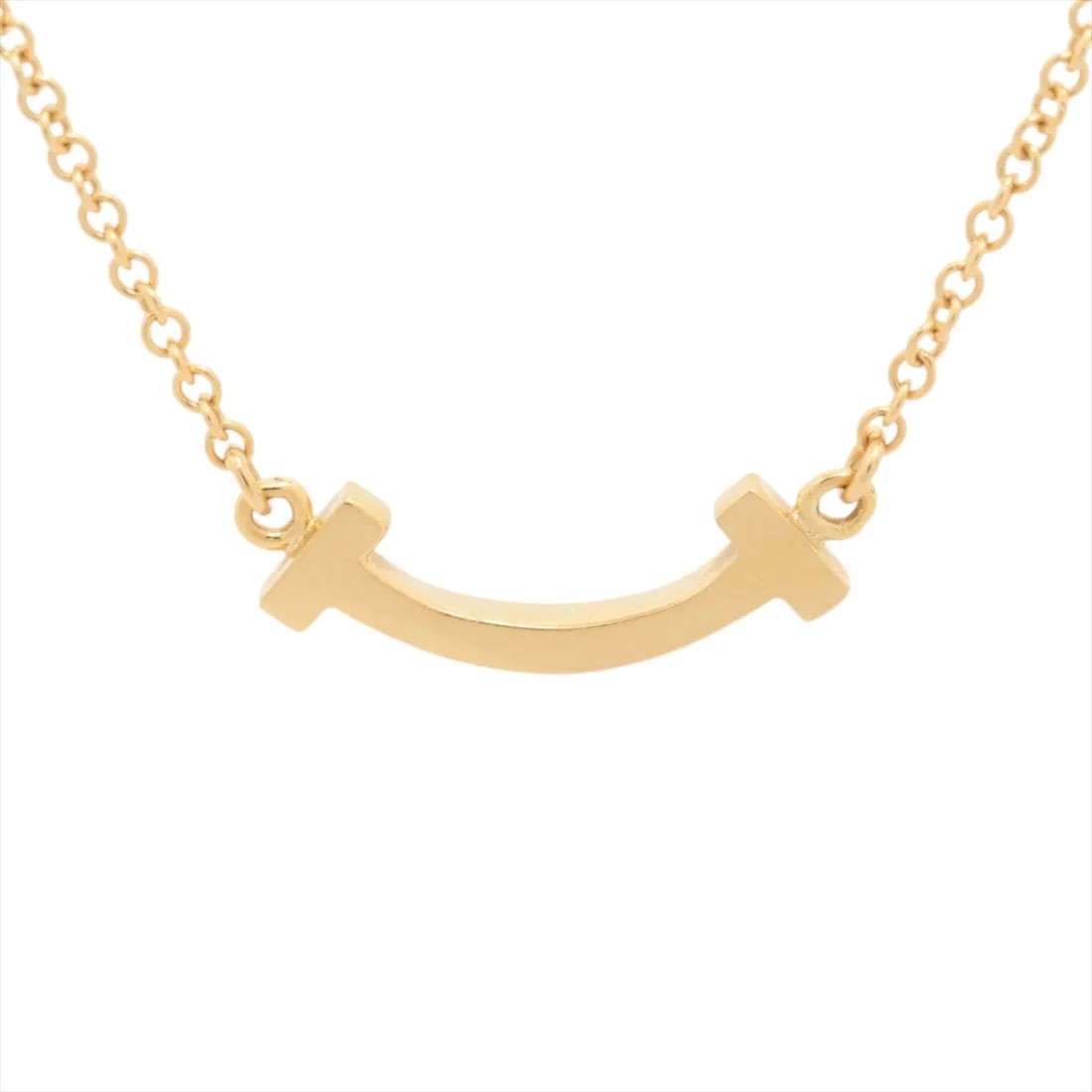 TIFFANY T SMILE MINI NECKLACE: Tiffany T Smile Mini Necklace Brand: Tiffany Type/Style: Necklace Material: 750(YG), Color: YG Size: Size(CM) Chain length:46 Accessories: None Accessories Notice: When purchasing pre-owned