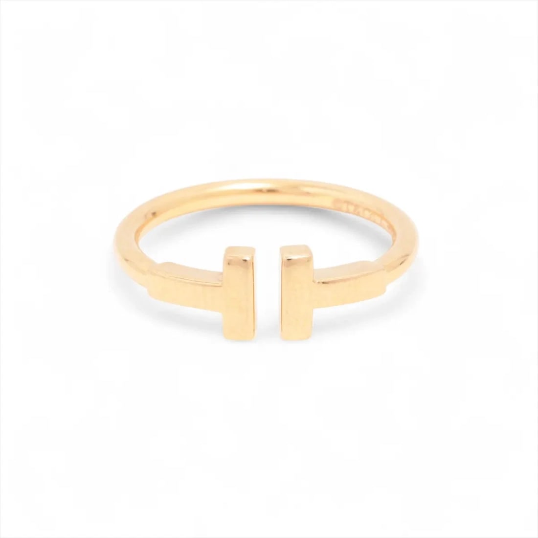 TIFFANY T WIRE RING 750(PG): Tiffany T Wire Ring 750(PG) Brand: Tiffany Type/Style: Ring Material: 750(PG), Main Stone/Creation Natural Color: PG Size: 5.25- 5.50 USUS Accessories: None Accessories Notice: When