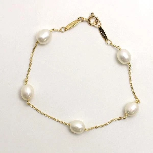 TIFFANY & CO. PEARL K18 GOLD BRACELET: Tiffany & Co. Pearl K18 Gold Bracelet Brand: Tiffany & Co. Type/Style: Bracelet Material: Metal Purity K18, Metal Gold, Color: Gold Size: Pearl (approx. 6mm wide x 7mm long)Material: 18KGold Size: