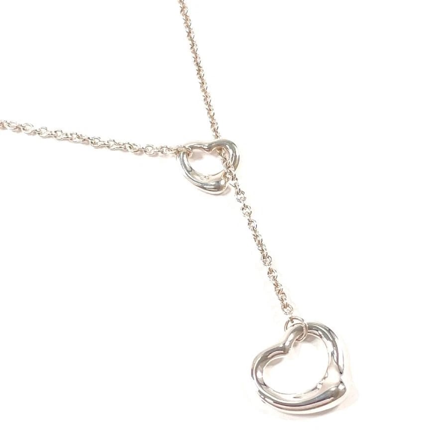 TIFFANY & CO. PERETTI OPEN HEART LARIAT 925 NECKLACE: Tiffany & Co. Peretti Open Heart Lariat 925 Necklace Brand: Tiffany & Co. Type/Style: Necklace Material: Metal Purity 925, Metal Silver, Color: Silver Size: Total Length: Approx. 48cm, Small Heart