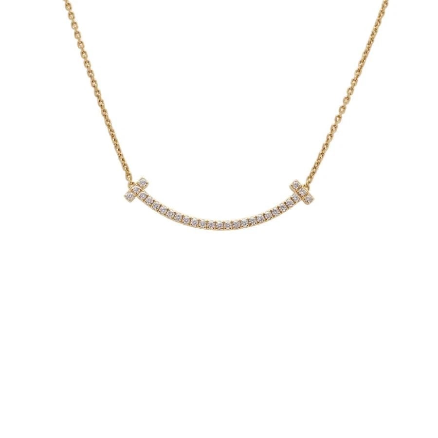 TIFFANY & CO. T SMILE DIAMOND K18YG NECKLACE: Tiffany & Co. T Smile Diamond K18YG Necklace Brand: Tiffany & Co. Type/Style: Necklace Material: Metal Purity K18, Metal Yellow Gold, Main Stone/Creation Natural Color: Yellow Gold Size: Motif Siz
