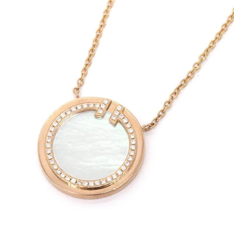 TIFFANY & CO. T CIRCLE PEARL DIAMOND K18RG NECKLACE: Tiffany & Co. T Circle Pearl Diamond K18RG Necklace Brand: Tiffany & Co. Type/Style: Necklace Material: Metal Purity K18, Metal Rose Gold, Main Stone/Creation Natural Color: Rose Gold Size: Effect