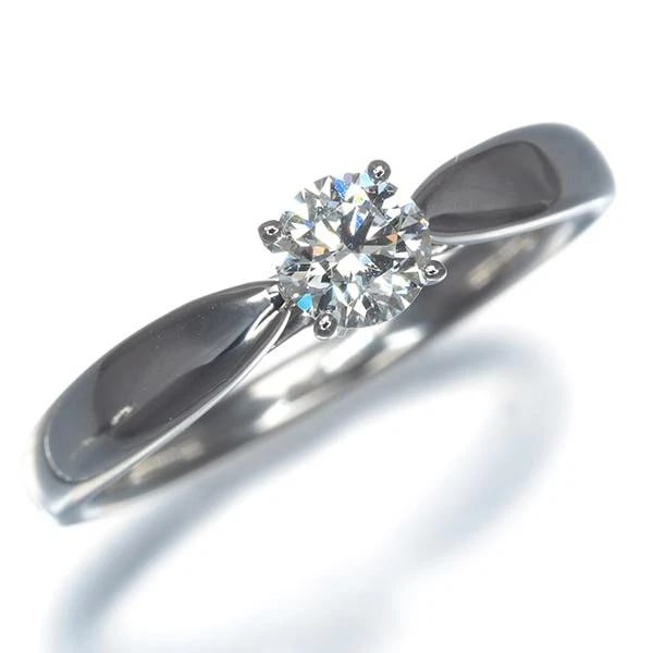 TIFFANY & CO. HARMONY SOLITAIRE DIAMOND RING: Tiffany & Co. Harmony Solitaire Diamond Ring Brand: Tiffany & Co. Type/Style: Ring Material: Metal Purity Pt950, Metal Platinum, Main Stone/Creation Natural Color: Platinum Size: US 5 Accessories