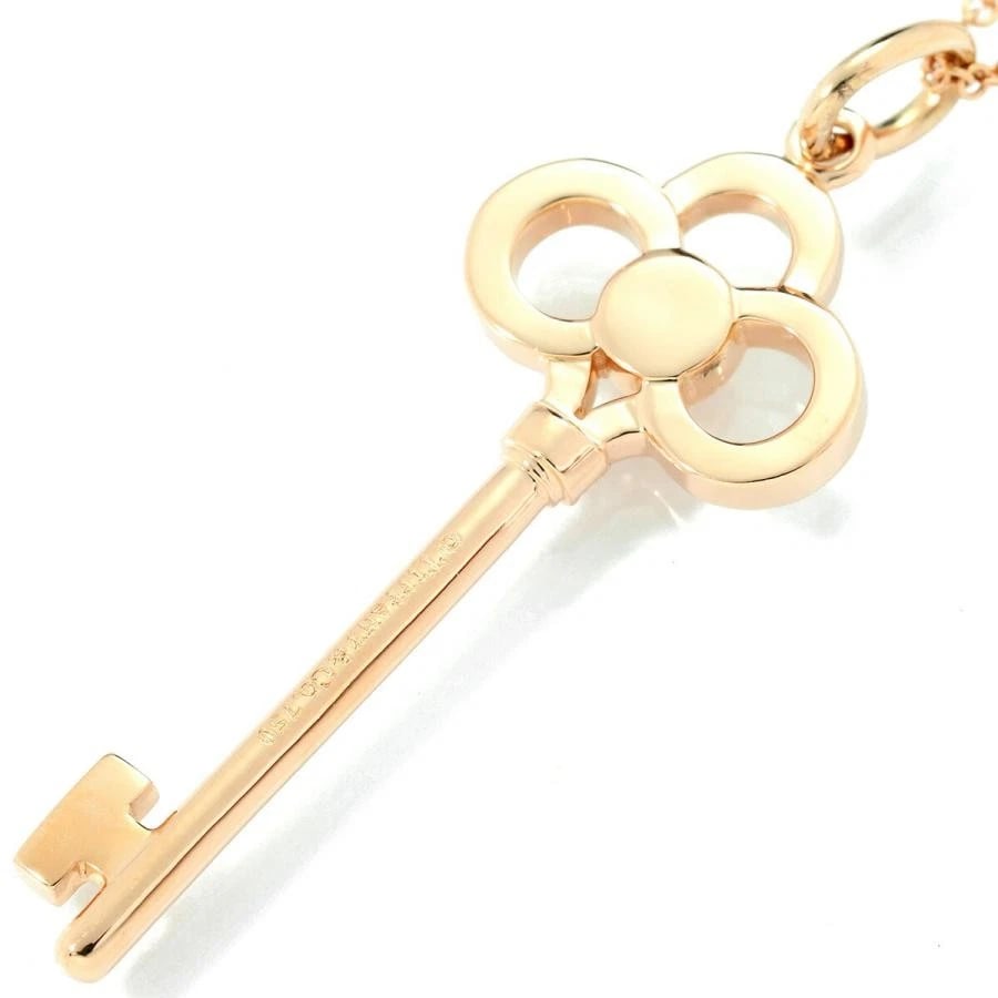 TIFFANY & CO. CROWN KEY DIAMOND K18PG NECKLACE: Tiffany & Co. Crown Key Diamond K18PG Necklace Brand: Tiffany & Co. Type/Style: Necklace Material: Metal Purity K18, Metal Pink Gold, Main Stone/Creation Natural Color: Pink Gold Size: Top Design