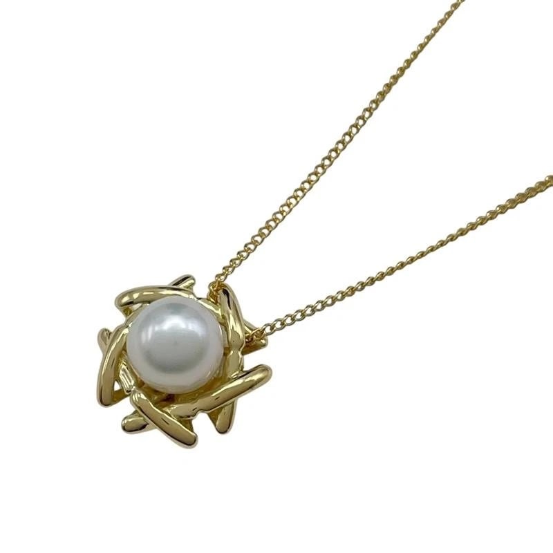 TIFFANY & CO. KISS AROUND PEARL GOLD 750 NECKLACE: Tiffany & Co. Kiss Around Pearl Gold 750 Necklace Brand: Tiffany & Co. Type/Style: Necklace Material: Metal Purity 750, Metal Gold, Color: Gold Size: Length: approx. 12.5mmWidth: approx. 12.5mmCha